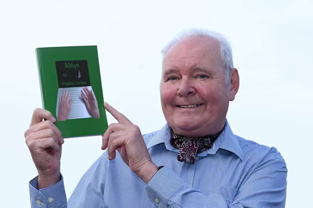 Wigan author Stephen Corless with his latest book R06yn