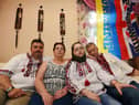 Ukrainian couple Ruslan Vorozhkin, left, and Svitlana Vorozhkina, second from right, who have lived in Wigan for over 12 years, are delighted to welcome Svitlana's refugee parents Ganna and Sergii, right,  who fled the war in Ukraine, but are unhappy at the lack of support they have.  They also want help to send emergency and medical items to people who are still in Ukraine.