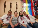 Ukrainian couple Ruslan Vorozhkin, left, and Svitlana Vorozhkina, second from right, who have lived in Wigan for over 12 years, are delighted to welcome Svitlana's refugee parents Ganna and Sergii, right,  who fled the war in Ukraine, but are unhappy at the lack of support they have.  They also want help to send emergency and medical items to people who are still in Ukraine.