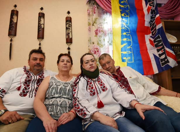 Ukrainian couple Ruslan Vorozhkin, left, and Svitlana Vorozhkina, second from right, who have lived in Wigan for over 12 years, are delighted to welcome Svitlana's refugee parents Ganna and Sergii, right,  who fled the war in Ukraine, but are unhappy at the lack of support they have.  They also want help to send emergency and medical items to people who are still in Ukraine.