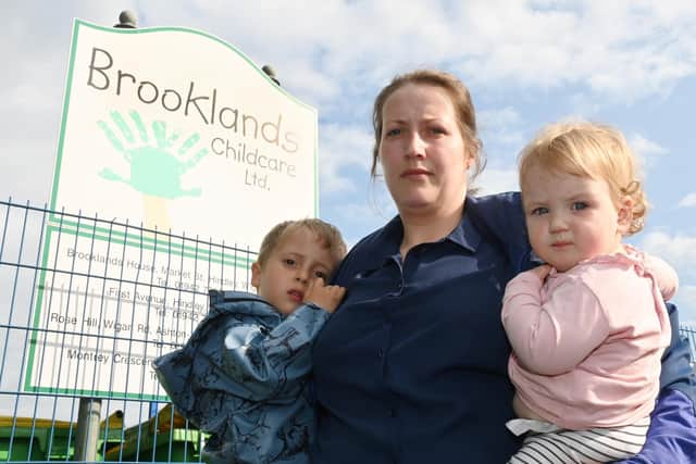 Melissa Waring with her children George, three, and Charlotte, one, who attend Brooklands Childcare in Garswood