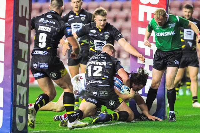 Liam Byrne went over for the first try of Wigan's cup run in a home game against Salford Red Devils.