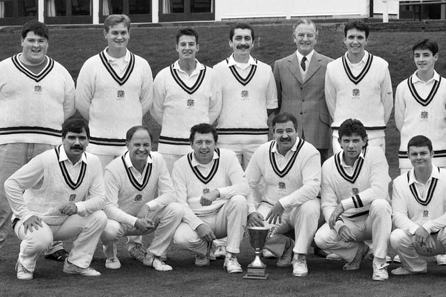 Wigan Cricket Club first team with President Harold Bullough after a successful season when they won the Stockton Championship Trophy and the Burtonwood Trophy mid-week knock out competition in the Manchester Association's centenary season of 1992.