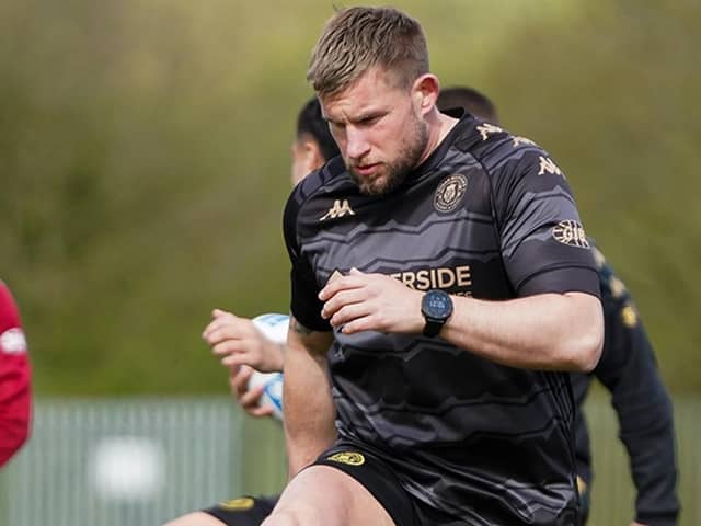 Mike Cooper is back in the Warriors squad for the visit of Castleford