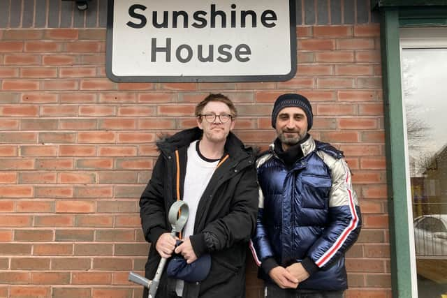 Mo Ahmed and William Elvin outside Sunshine House in Scholes