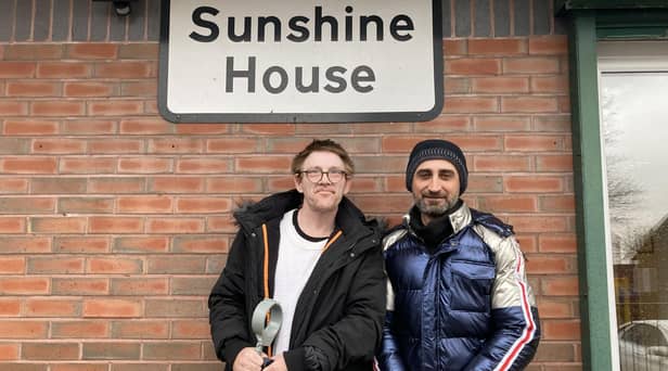 Mo Ahmed and William Elvin outside Sunshine House in Scholes