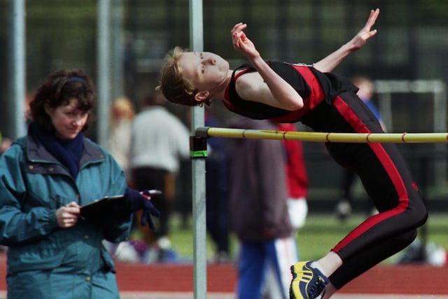 Wigan Harriers' Rachel Culshaw clears the bar in the Under 15s girls high jump in the first Mid-Lancs League meeting of the season at the Robin Park Arena on Saturday 17th of April 1999.