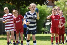 Key Stage Two pupils  enjoy their sports day at St Paul's Primary School, Goose Green, Wigan.