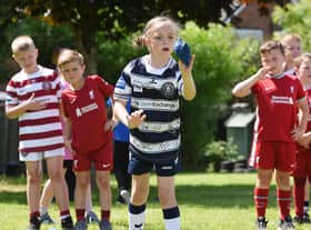 Key Stage Two pupils  enjoy their sports day at St Paul's Primary School, Goose Green, Wigan.