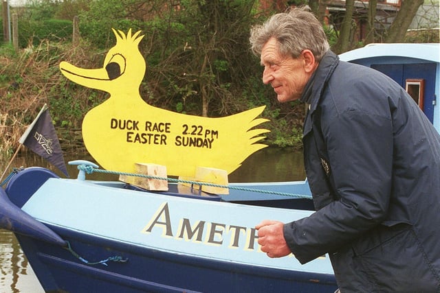 Ken Bonikowski, from Wigan, owner of "Amethyst", gets ready for the duck race, at the Douglas Valley Cruising Club 23rd Easter Boat Rally, at Appley Bridge in 1998.