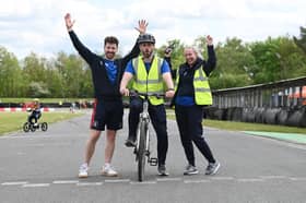 Members of the Be Well team give a warm welcome to everyone at the Cycle Three Sisters event.