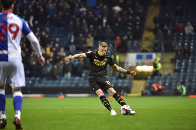 James McClean in action for Latics at Blackburn
