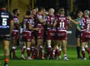 Wigan Warriors overcame Castleford Tigers