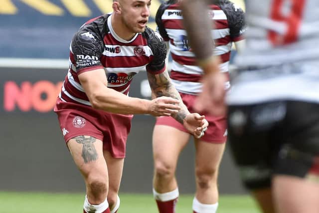 Powell in action against Salford Red Devils