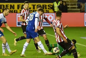 Nathan Broadhead slots home Latics' response at the DW