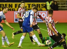 Nathan Broadhead slots home Latics' response at the DW