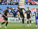Will Keane is denied in stoppage-time