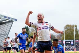 Wigan Warriors winger Liam Marshall in action for England