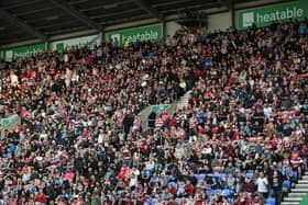 Thousands of Wigan fans (many pictured here at the Super League semi-final against Leigh) will be heading to Old Trafford on Saturday