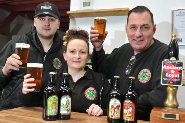 The team at Martland Mill Brewery, from left, head brewer Luke Blundell, Delia Wood and Paul Wood in 2019. The business was wound up in 2021