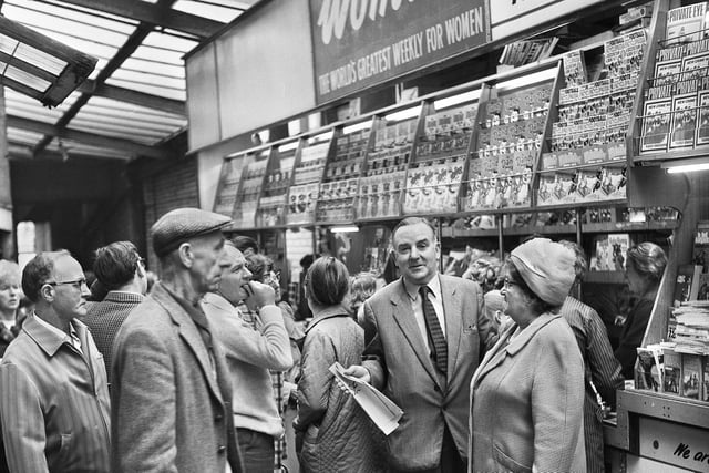 Sid Smith near his busy newspaper stall in the Market Arcade, better known as the Old Arcade, in Wigan in September 1971.