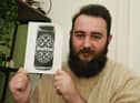 Wigan poet James Walton, who got into writing poetry through lockdown, with his first book, Beltin'