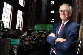 Owner of Leigh Spinners Mill, Peter Horrocks in the engine room.