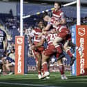 Wigan celebrate Patrick Mago's try against Leeds