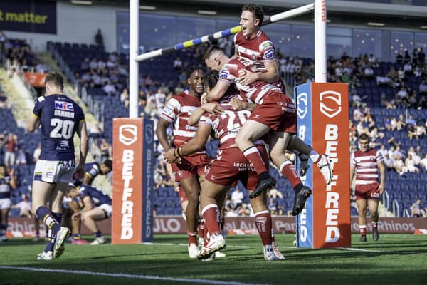 Wigan celebrate Patrick Mago's try against Leeds