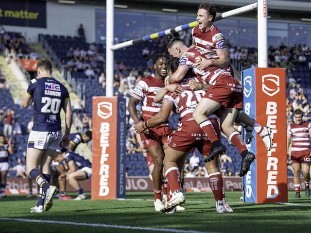 Wigan celebrate Patrick Mago's try against Leeds
