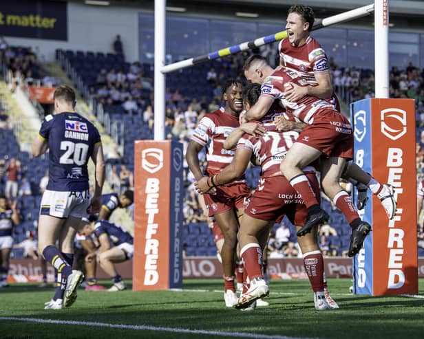 Wigan celebrate Patrick Mago's try against Leeds