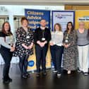 Representatives of Citizens Advice, Age UK and Wigan Council at a pop-up event to make sure people are getting financial help