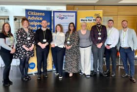Representatives of Citizens Advice, Age UK and Wigan Council at a pop-up event to make sure people are getting financial help