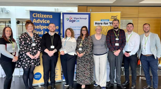 Representatives of Citizens Advice, Age UK and Wigan Council at a pop-up event to make sure people are getting financial help