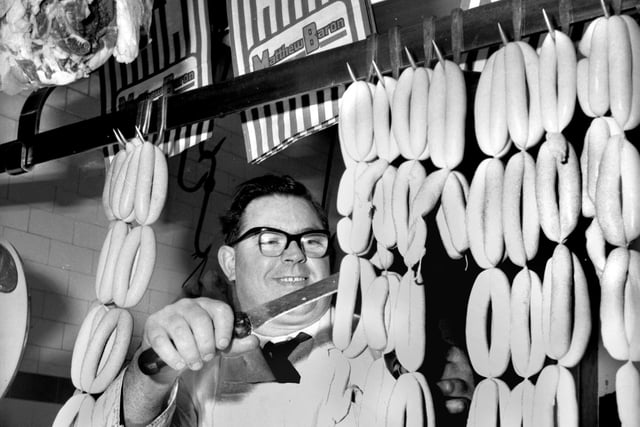 Butcher Fred Barton at work in his Wigan shop in 1969.