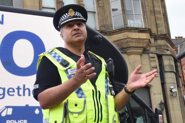 Assistant Chief Constable Wasim Chaudhry speaks to officers in Wigan town centre.