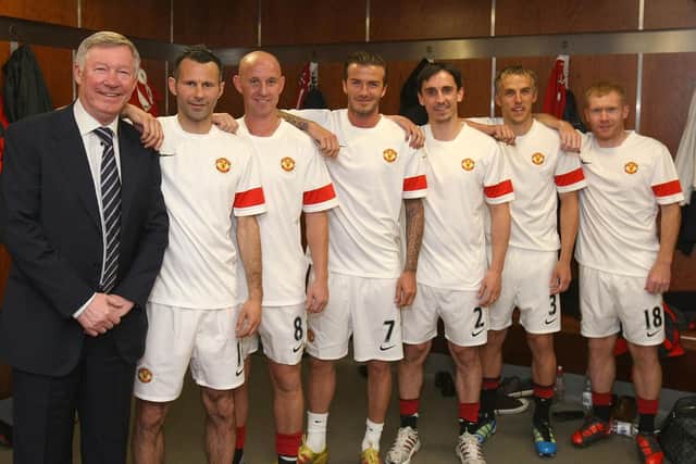 MANCHESTER, ENGLAND - MAY 24: (EXCLUSIVE COVERAGE: MINIMUM FEES APPLY - 250GBP OR LOCAL EQUIVALENT, PER IMAGE) (L-R) Sir Alex Ferguson, Ryan Giggs, Nicky Butt, David Beckham, Gary Neville, Phil Neville and Paul Scholes of Manchester United recreate the famous Class of '92 photo from 1992 ahead of Gary Neville's testimonial match between Manchester United and Juventus at Old Trafford on May 24, 2011 in Manchester, England. (Photo by John Peters/Manchester United via Getty Images)