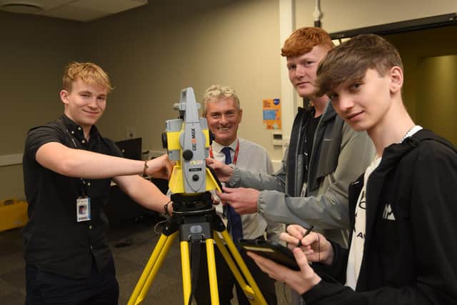 T-level civil engineering students James Newman, Jake Mullaney and Ryan Hupton with tutor Martin Gilmore