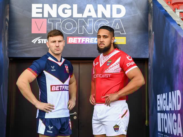 England’s George Williams and Tonga’s Keon Koloamatangi at the Totally Wicked Stadium, St Helens