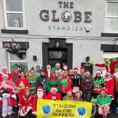 Standish Globe Runers raised a total of £500 for two causes