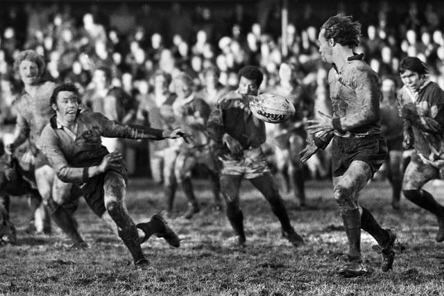 Orrell man of the match, Peter Phillips, who scored two tries, fires out a pass against Harlequins in the National Tournament Knock Out Cup Round 2 match at Edge Hall Road on Saturday 9th of February 1974.
The win against the famous Harlequins received wide press coverage prompting the famous quote "Beaten by a lay-by off the M6!"
Orrell won 25-7.