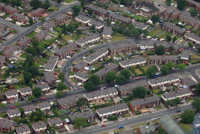 WIGAN AERIAL PICTURES - Guilford Crescent, Beech Hill, leading onto Thicknese Avenue, with Beech Hill Avenue and St Anne's CE Church, bottom, Rose Avenue, top, and The Wellfield Pub on Wellfield Road, top right.