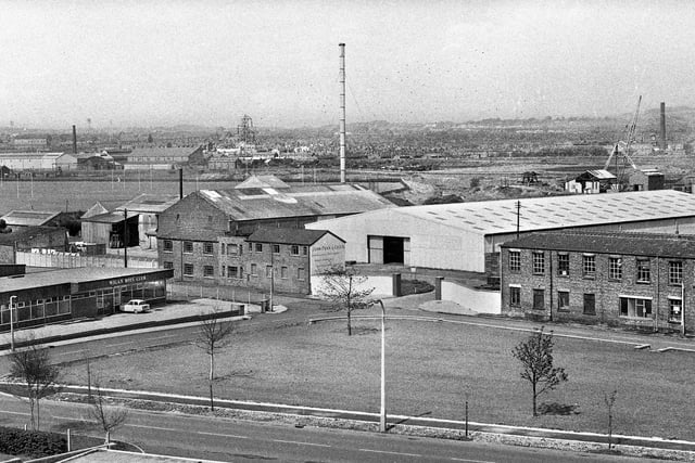 A 1960s view with Robin Park Road, Newtown, in the foreground and Soho Street running parallel with the John Peak and Co. Ltd. agricultural fertilisers factory prominent. Wigan Boys' Club can be seen, left, on Wenlock Street and in the background are the old Robin Park playing fields.