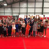Councillors Chris Ready and Jenny Bullen (far left) with kids at a HAF activity camp at Robin Park Leisure Centre last summer