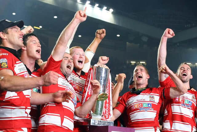 Wigan celebrate the 2010 Grand Final triumph, including Liam Farrell and Joel Tomkins
