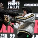 Deontay Wilder (L) and Tyson Fury get into an altercation during their press conference at the MGM Grand Las Vegas (Photo: JOHN GURZINSKI/AFP via Getty Images)