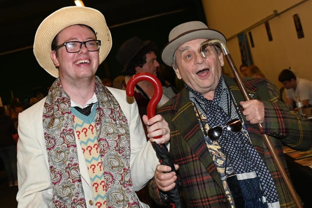 Doctor Who star Sylvester McCoy, right, meets fans and poses for photographs.