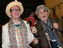 Doctor Who star Sylvester McCoy, right, meets fans and poses for photographs.