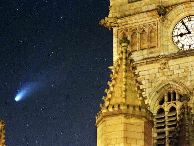 Our photographer Frank Orrell captured the Hale-Bopp comet in the night sky over Wigan Parish Church on Sunday 30th of March 1997.
