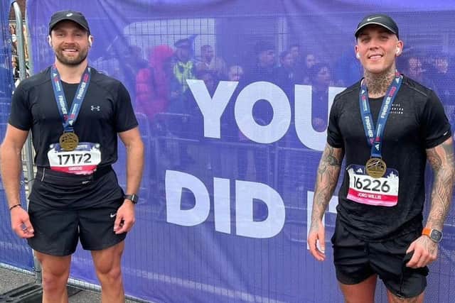 Jordan (right) with Gregg Jaymes (left) after completing the Manchester Marathon in April.